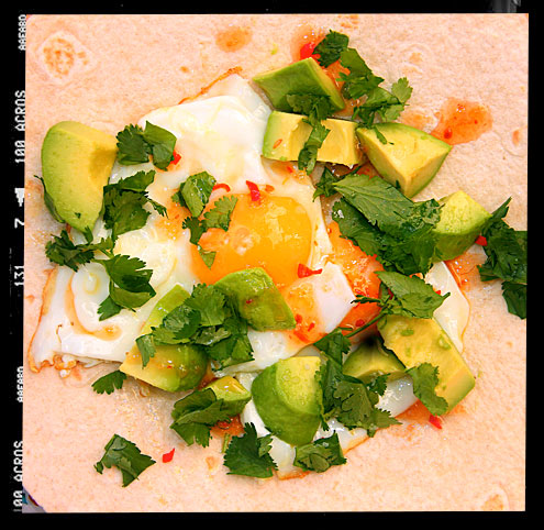 Fried egg, avocado and chilli tacos